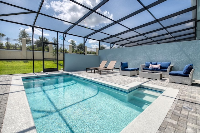 view of swimming pool with a patio area, a lanai, and an outdoor hangout area