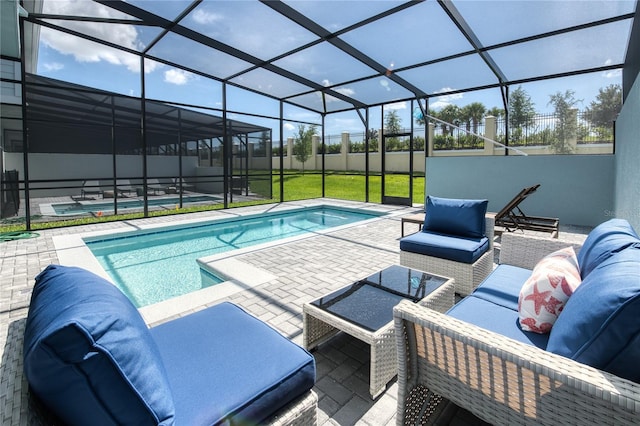 view of swimming pool with a lanai, an outdoor living space, a lawn, and a patio