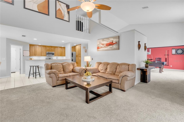 carpeted living room featuring ceiling fan, high vaulted ceiling, and billiards