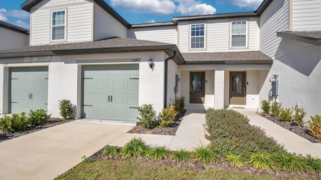 view of front of property with a garage