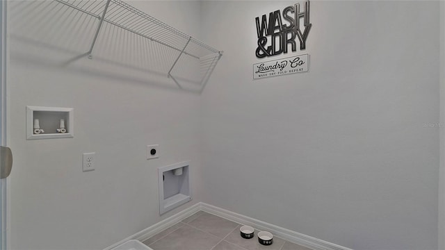 washroom featuring tile patterned flooring, hookup for an electric dryer, and hookup for a washing machine