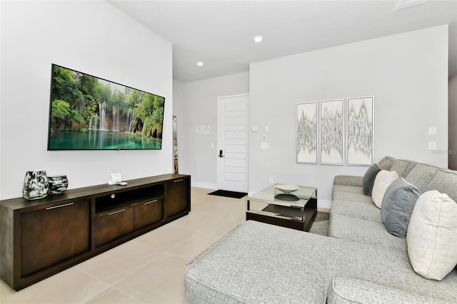 living room with light tile patterned floors