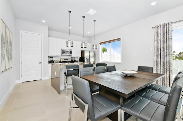 dining room featuring light tile patterned floors