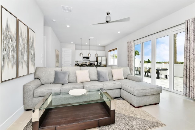 living room featuring ceiling fan