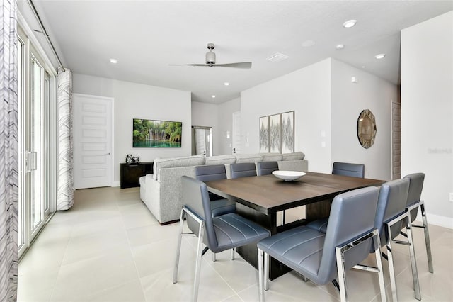 tiled dining room with ceiling fan