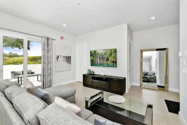 living room with light tile patterned floors