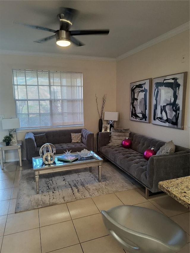 living room featuring ceiling fan, light tile patterned floors, and ornamental molding