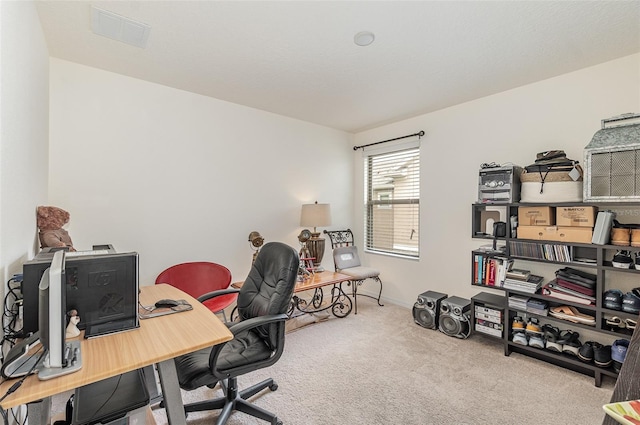 home office with carpet flooring