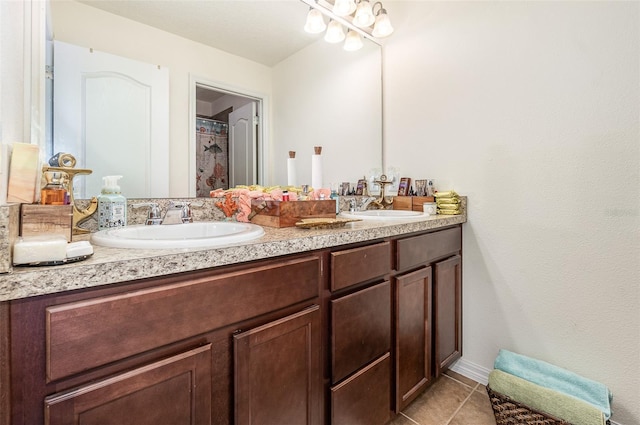 bathroom featuring vanity and tile patterned flooring