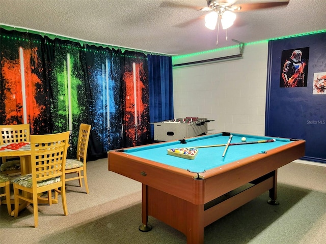 playroom with a textured ceiling, carpet floors, and billiards