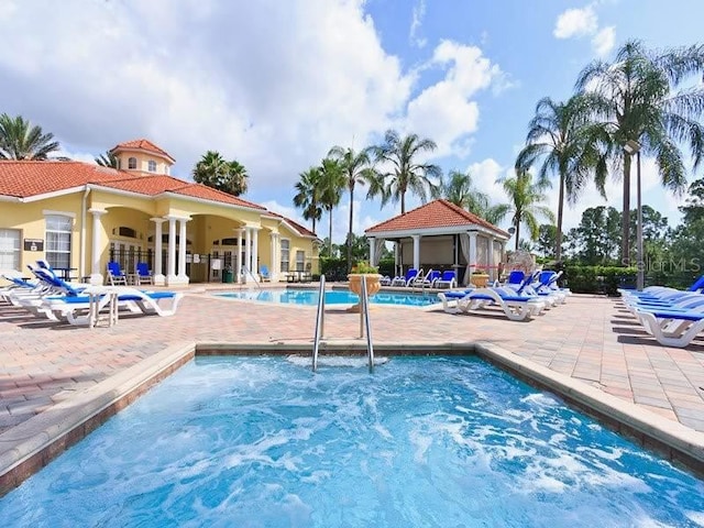 view of pool with a patio area