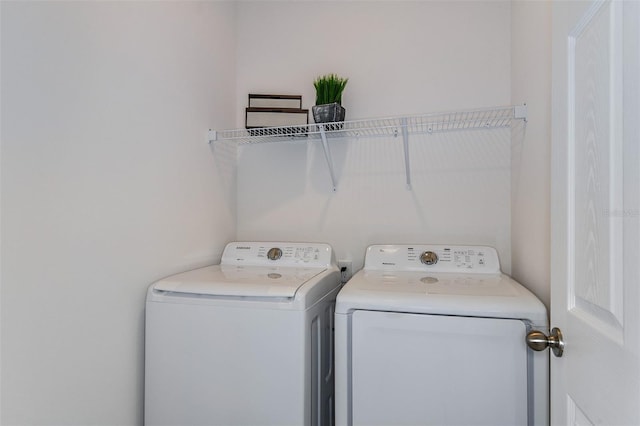 laundry area featuring laundry area and separate washer and dryer