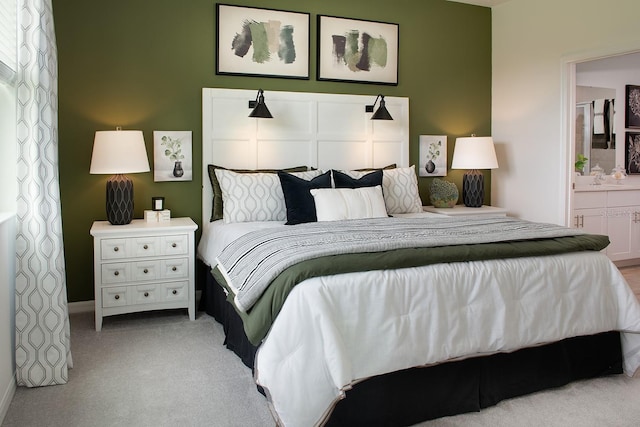 bedroom featuring carpet floors and ensuite bathroom