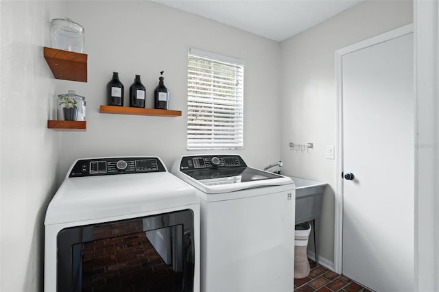 laundry area with washer and dryer