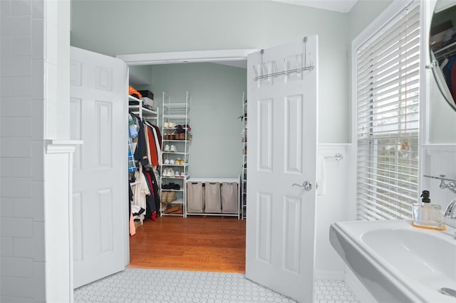 bathroom with tile patterned floors and sink