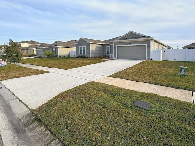 ranch-style home with a front yard and a garage