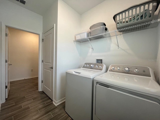 laundry room with washing machine and clothes dryer