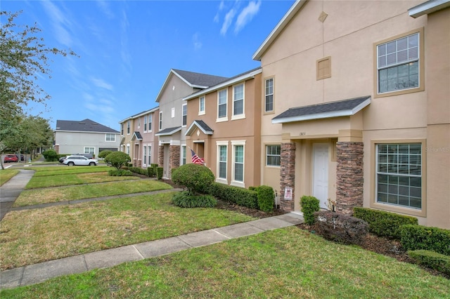 view of front of property with a front lawn