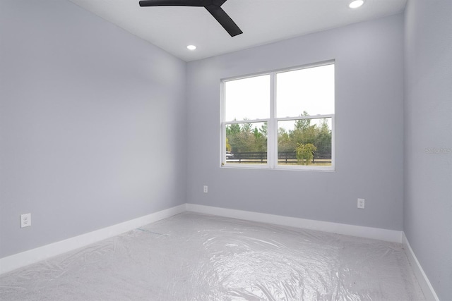 unfurnished room featuring ceiling fan