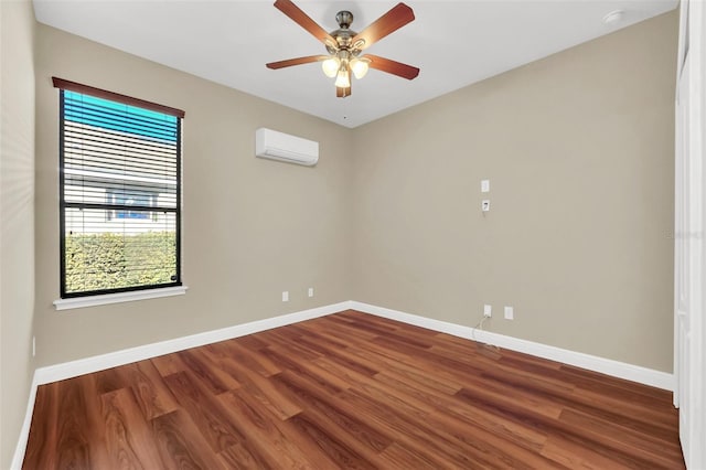 empty room featuring ceiling fan, dark hardwood / wood-style flooring, and an AC wall unit