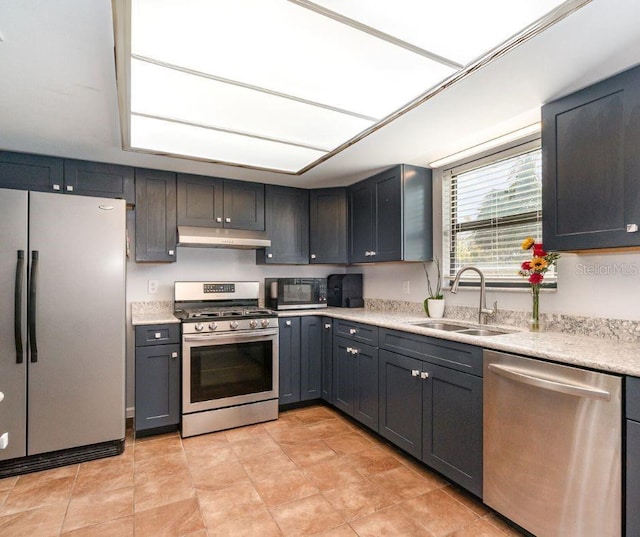 kitchen featuring stainless steel appliances and sink