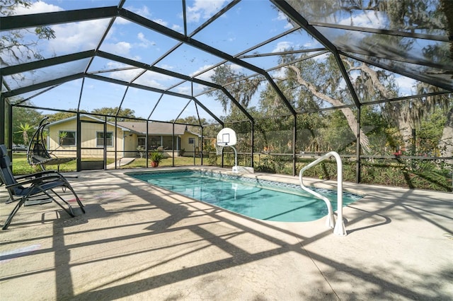 view of pool featuring a lanai and a patio area