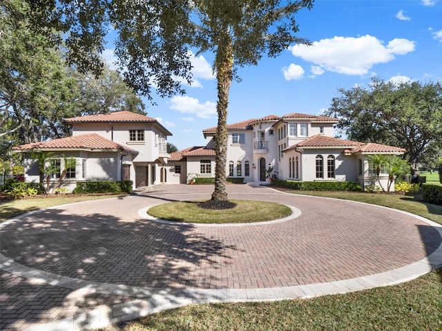 rear view of house with a garage