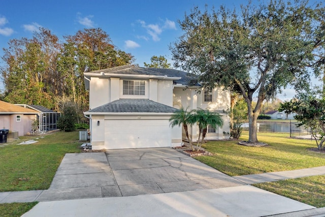 view of front facade featuring a front yard, a garage, central air condition unit, and a water view