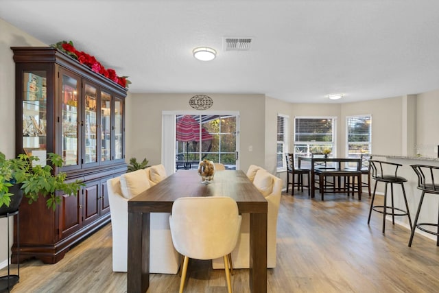 dining room featuring light wood-type flooring