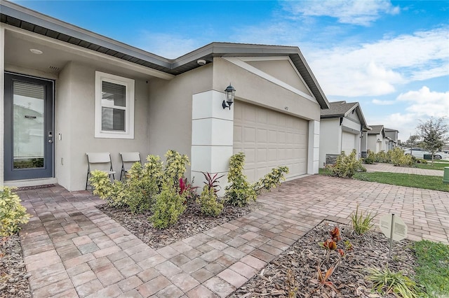 view of side of home featuring a garage