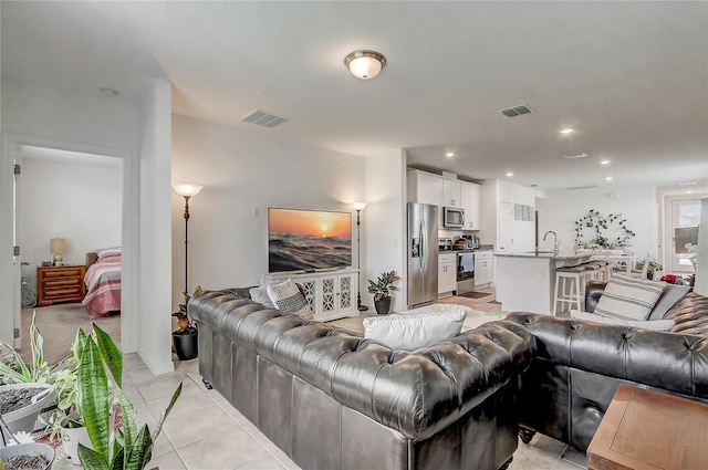 tiled living room with sink