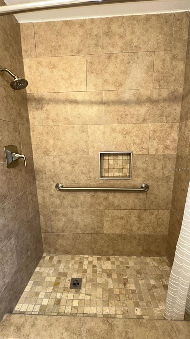 bathroom featuring walk in shower