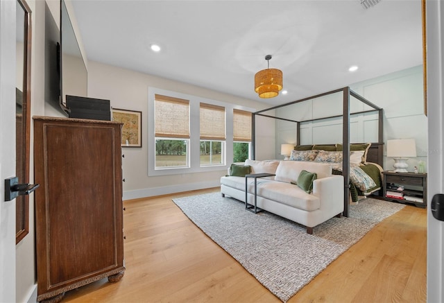 bedroom featuring light hardwood / wood-style flooring