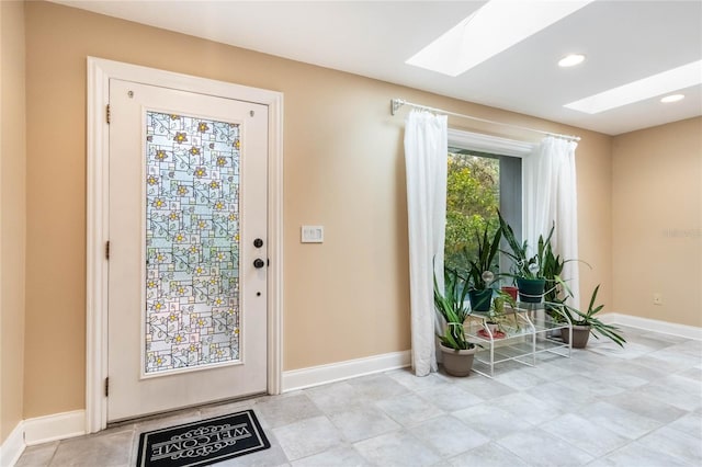 doorway featuring a skylight