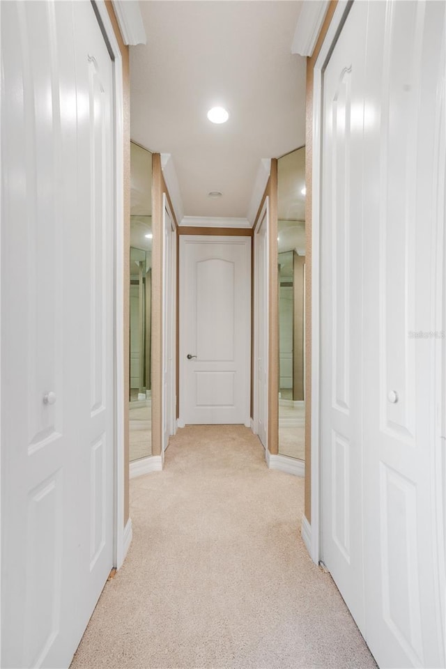 corridor with light colored carpet