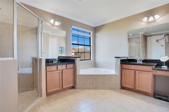 bathroom featuring crown molding, vanity, and separate shower and tub