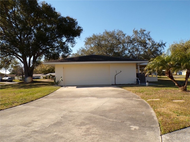 view of property exterior featuring concrete driveway, a lawn, an attached garage, and stucco siding