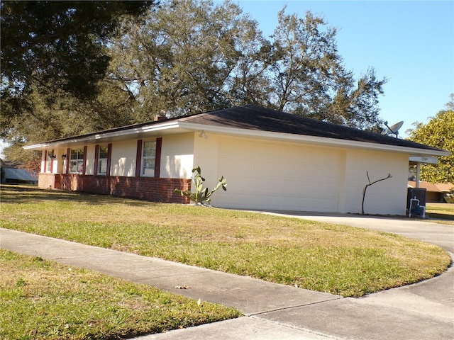 view of property exterior featuring a garage, concrete driveway, a lawn, and brick siding