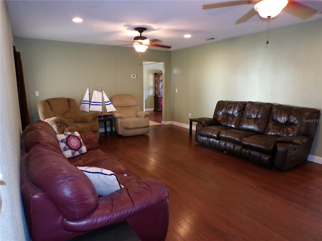 living room with recessed lighting, baseboards, and hardwood / wood-style floors