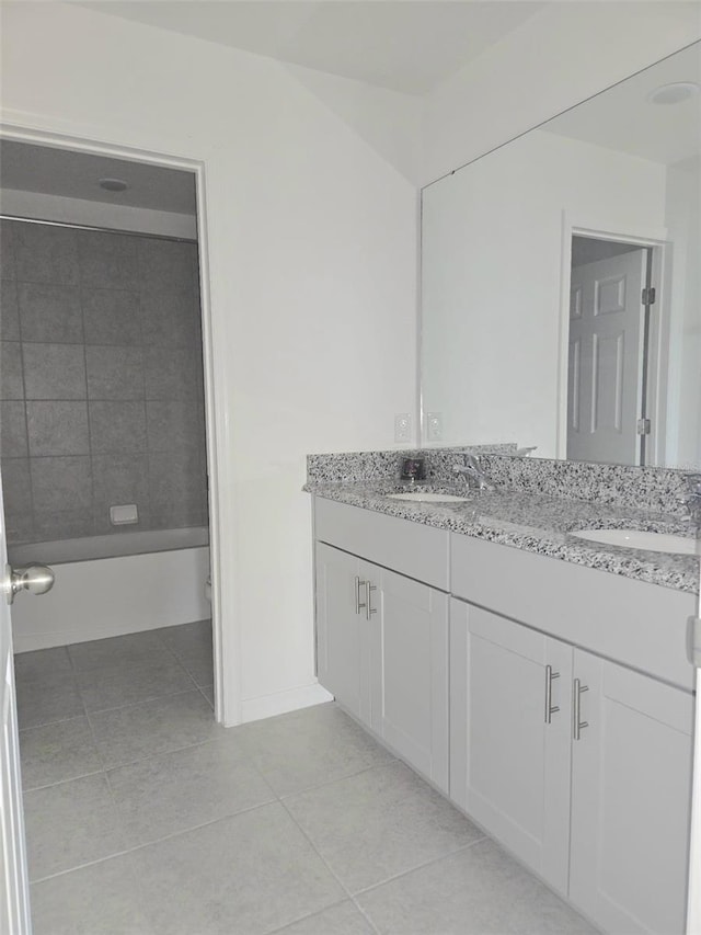 1603 Gardiner St, Haines City, FL 33844 - full bath with double vanity, tub / shower combination, a sink, and tile patterned floors