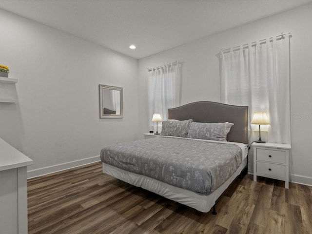 bedroom featuring dark hardwood / wood-style floors