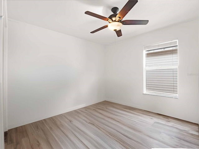 unfurnished room featuring ceiling fan and light hardwood / wood-style flooring