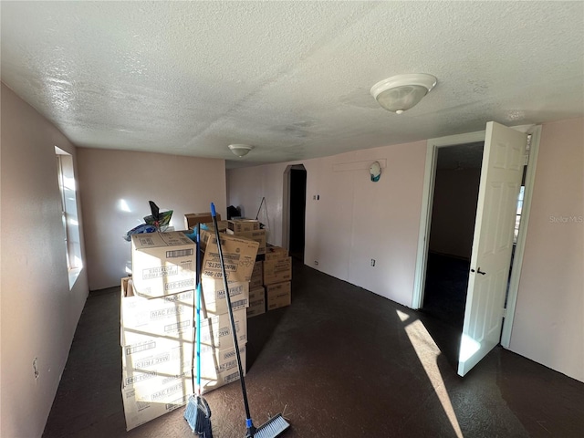 interior space featuring a textured ceiling