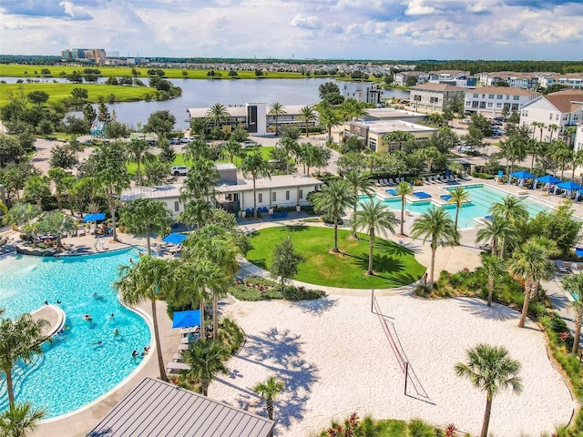 birds eye view of property featuring a water view