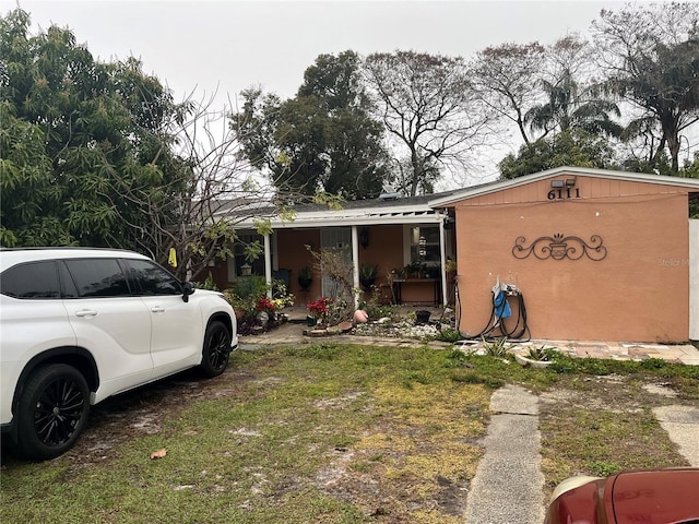 view of front of house with a front yard