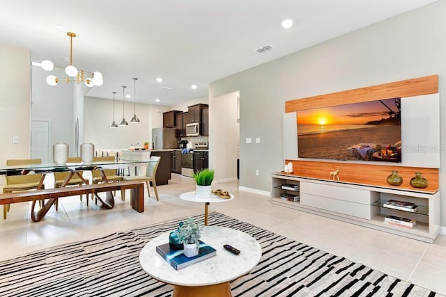 tiled living room with a chandelier