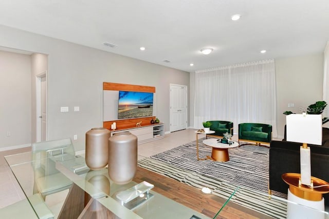 living room with light tile patterned flooring