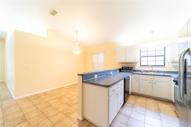 kitchen with decorative light fixtures, kitchen peninsula, light tile patterned floors, black dishwasher, and white cabinets