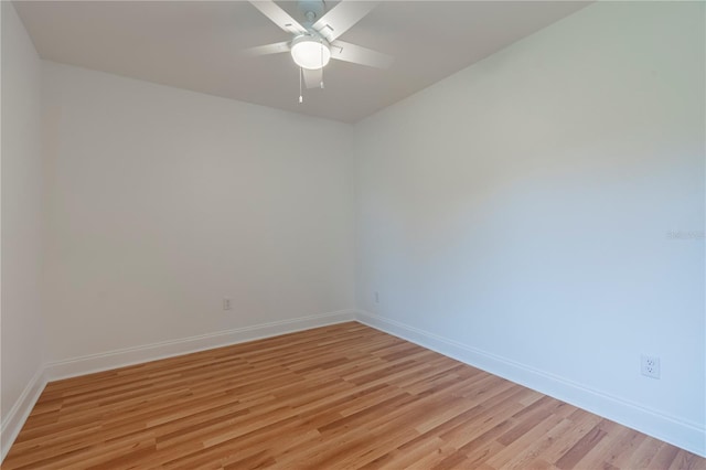 empty room with light hardwood / wood-style floors and ceiling fan