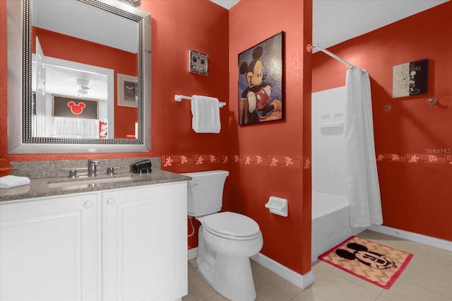 full bathroom with toilet, vanity, tile patterned floors, and shower / tub combo with curtain